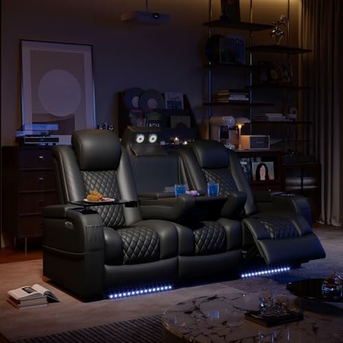 Luxury home theater seating with reclining chairs and ambient lighting.