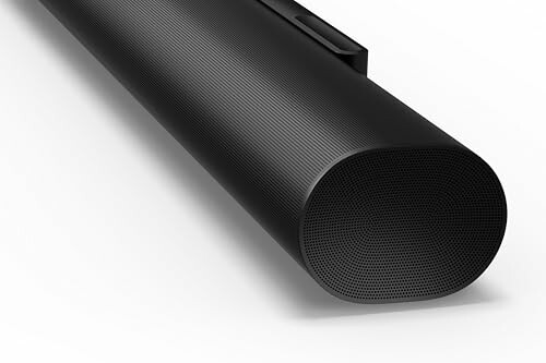 Close-up of a sleek black soundbar speaker with a focus on its acoustic architecture
