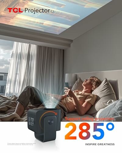 Person lying on bed using a TCL projector on the ceiling